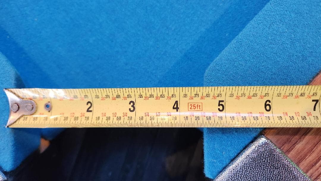 Tape measure showing TruShim pocket dimensions on Dynamo table